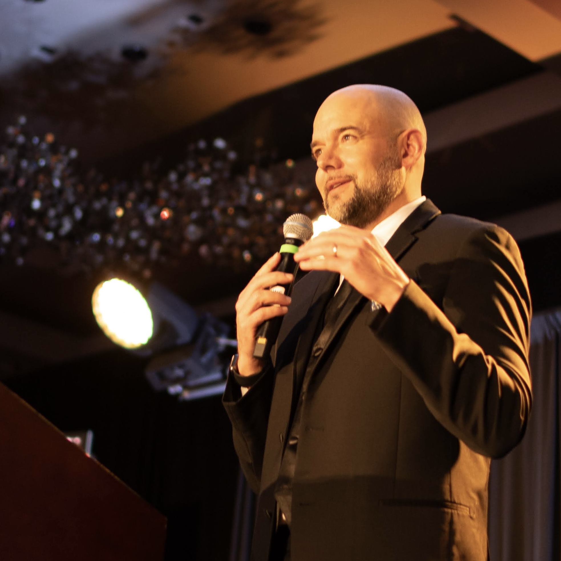 Dan speaking to an audience